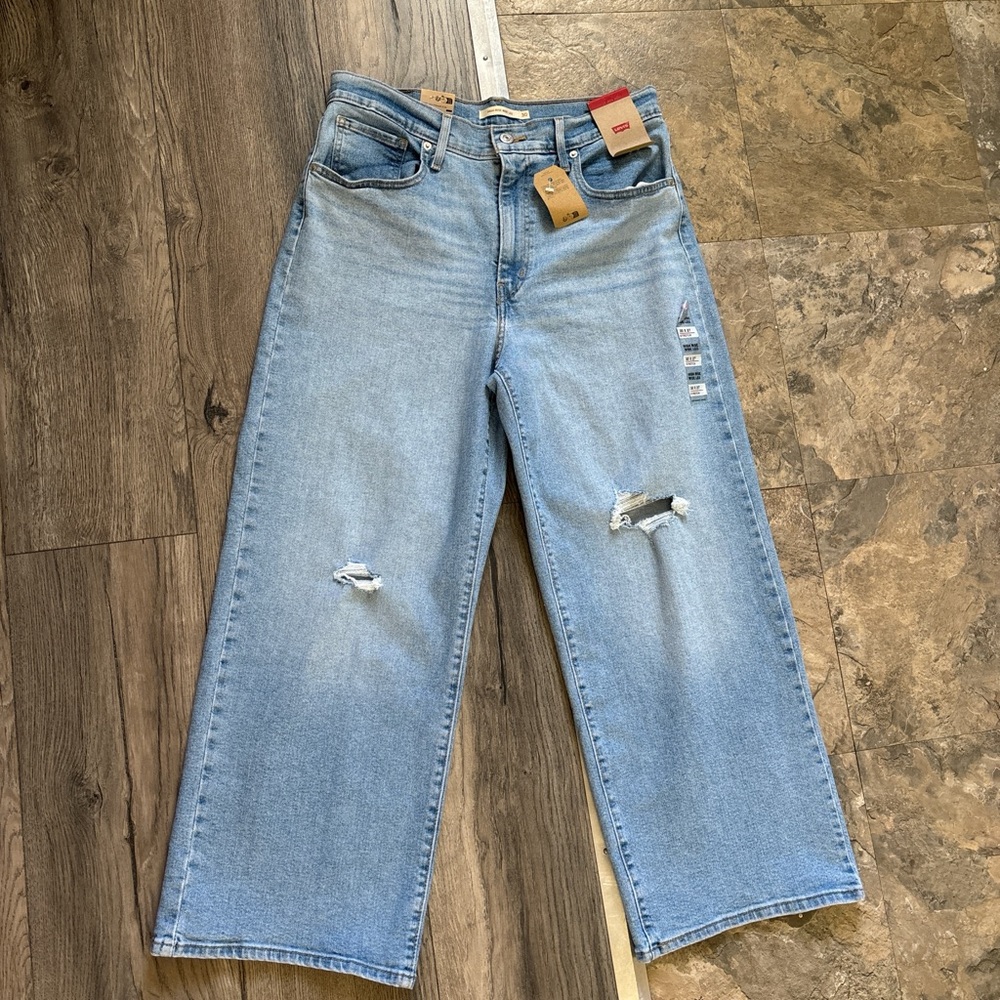 Women's Levi High Rise Light Blue Distressed Jeans